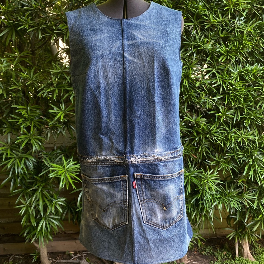 Upcycled backless denim shift dress. Made out of vintage 501 Levi’s. Size s/m.
